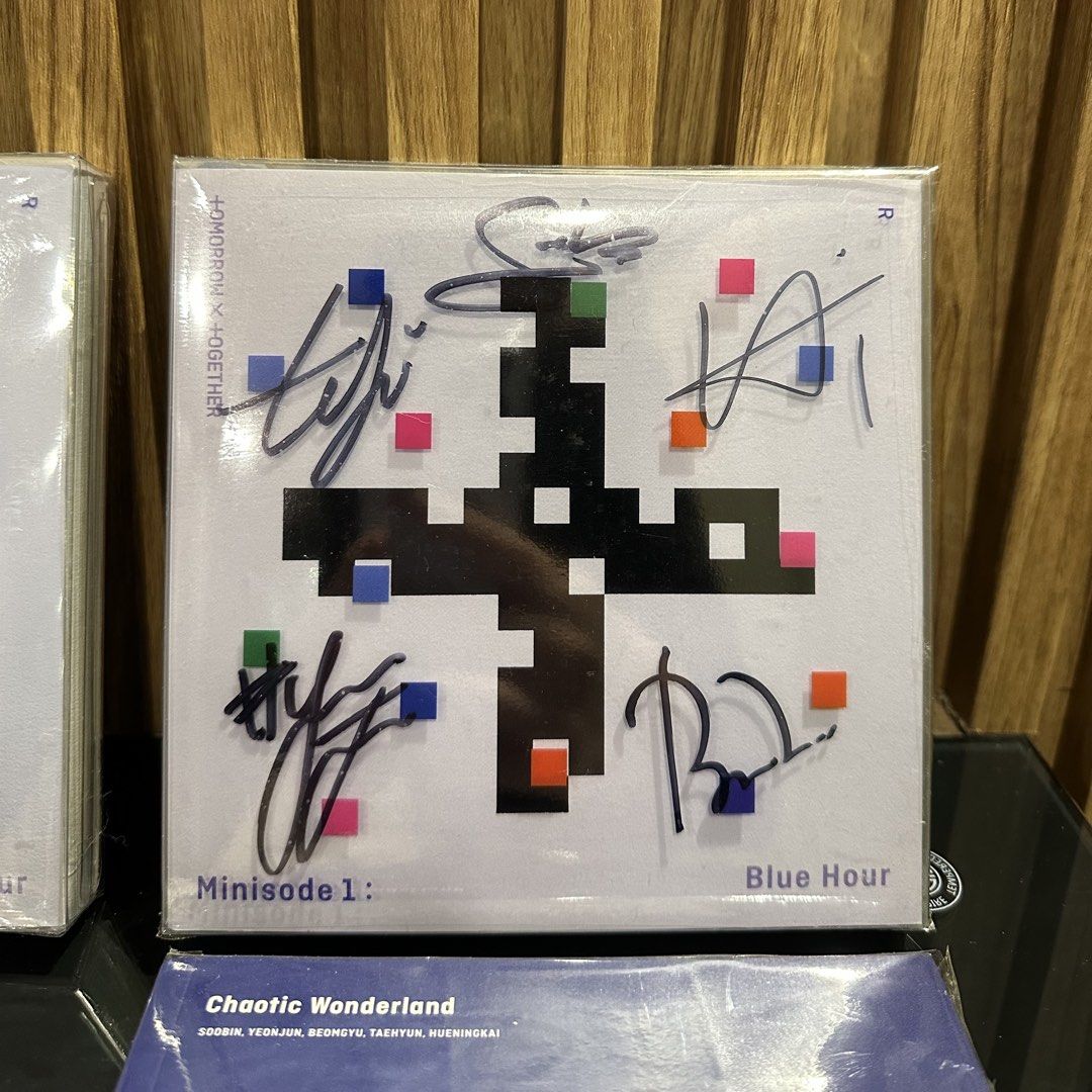 TXT OFFICIAL SIGNED ALBUM BUNDLE (Category: K-Wave Merchandise) located in Manila. Submitted by yours.fully (Listing ID 1441865772, Image 3). Description: Selling as a set. All items are official. Inclusions: ✦ 1 Signed Minisode1: Blue Hour Album (with photocard) ✦ 1 Minisode1: Blue Hour Album (no photocard) ✦ 1 Chaotic Wonderland Limited Edition B Album (no photocard) ✦ 2 Official TXT Postcards ✦ 1 TXT 2022 Deco Kit ID Photo Set Condition: ✓ Alb