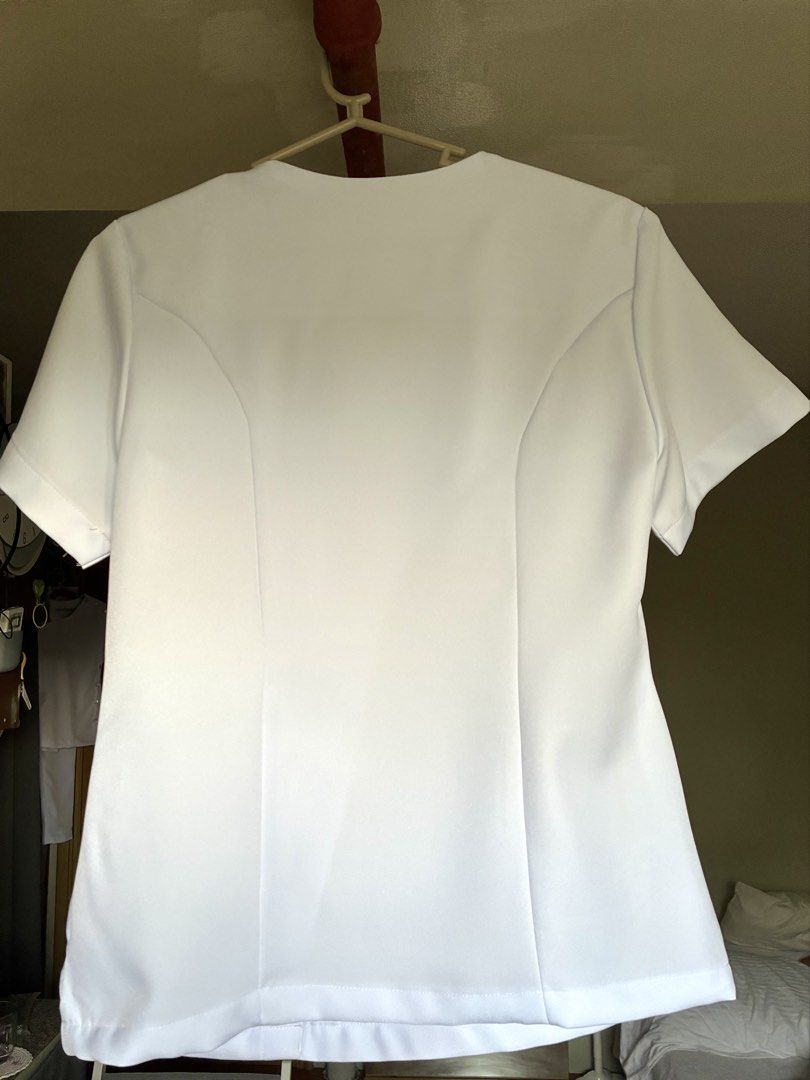 UERM White V-Neck Uniform Set (For Clerks) (Category: Sets or Coordinates) located in Quezon City. Submitted by lebeau_apparel (Listing ID 1441836337, Image 2). Description: 🔹UNUSED ❗️(customized) 🔹RFS: Gained weight 🔹Material: Peach Twill 🔹SIZING DETAILS: (1) TOP Bust: 36” Waist: 28” Length: 22” (2) PANTS Waist: 28” Hips: 38.5” Length: 38”.