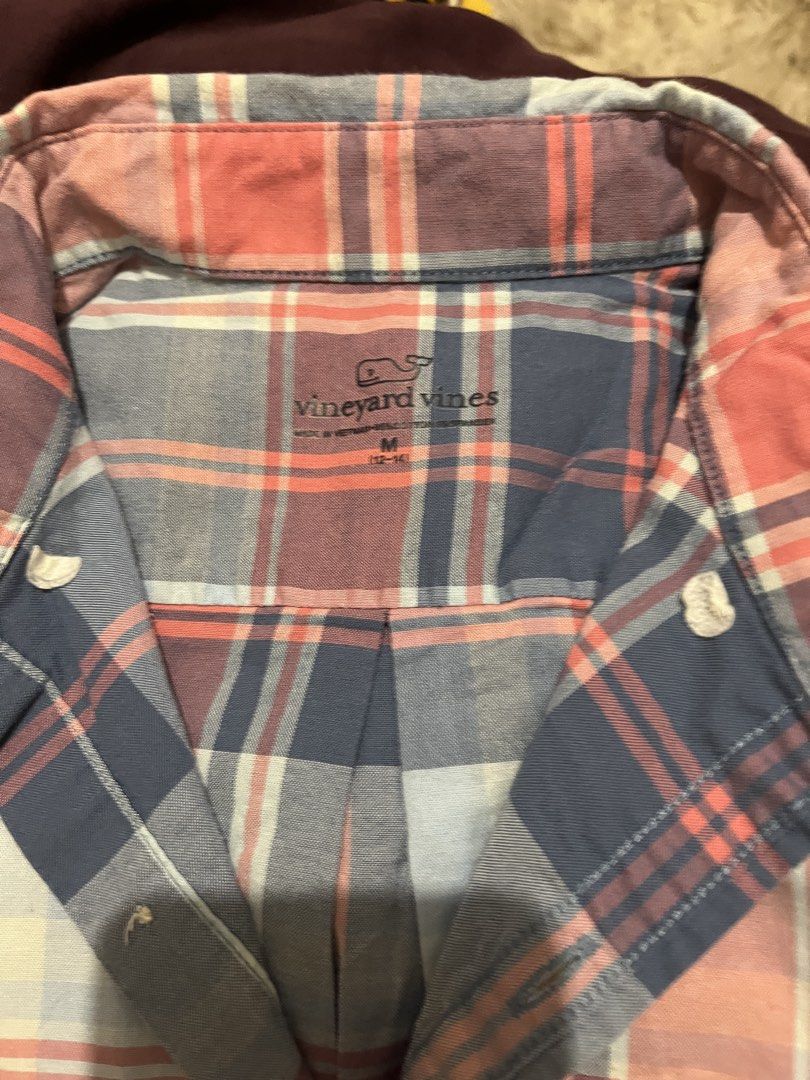 Vineyard Vines Plaid Button Down Shirt Size M (12-14) (Category: Tshirts & Polo Shirts ) located in Pasig City. Submitted by samotsari (Listing ID 1441931166, Image 2). Description: - Vineyard Vines Button Down Shirt - Classic Plaid Pattern (Blue, Red, White) - Size: Medium (fits ages 12-14) - Versatile for casual wear or layering - Button closure - Embroidered whale logo on chest pocket.