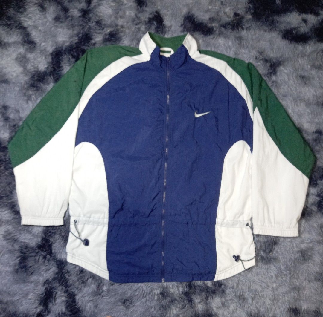 vintage 90s Nike windbreaker (Category: Coats, Jackets and Outerwear) located in Manila. Submitted by thirdy. (Listing ID 1441903298, Image 1). Description: -Made best offer na lng po sa interested salamat po -Youth size L on tag (12-14) -Dimes (26 X 30) -Very good condition.