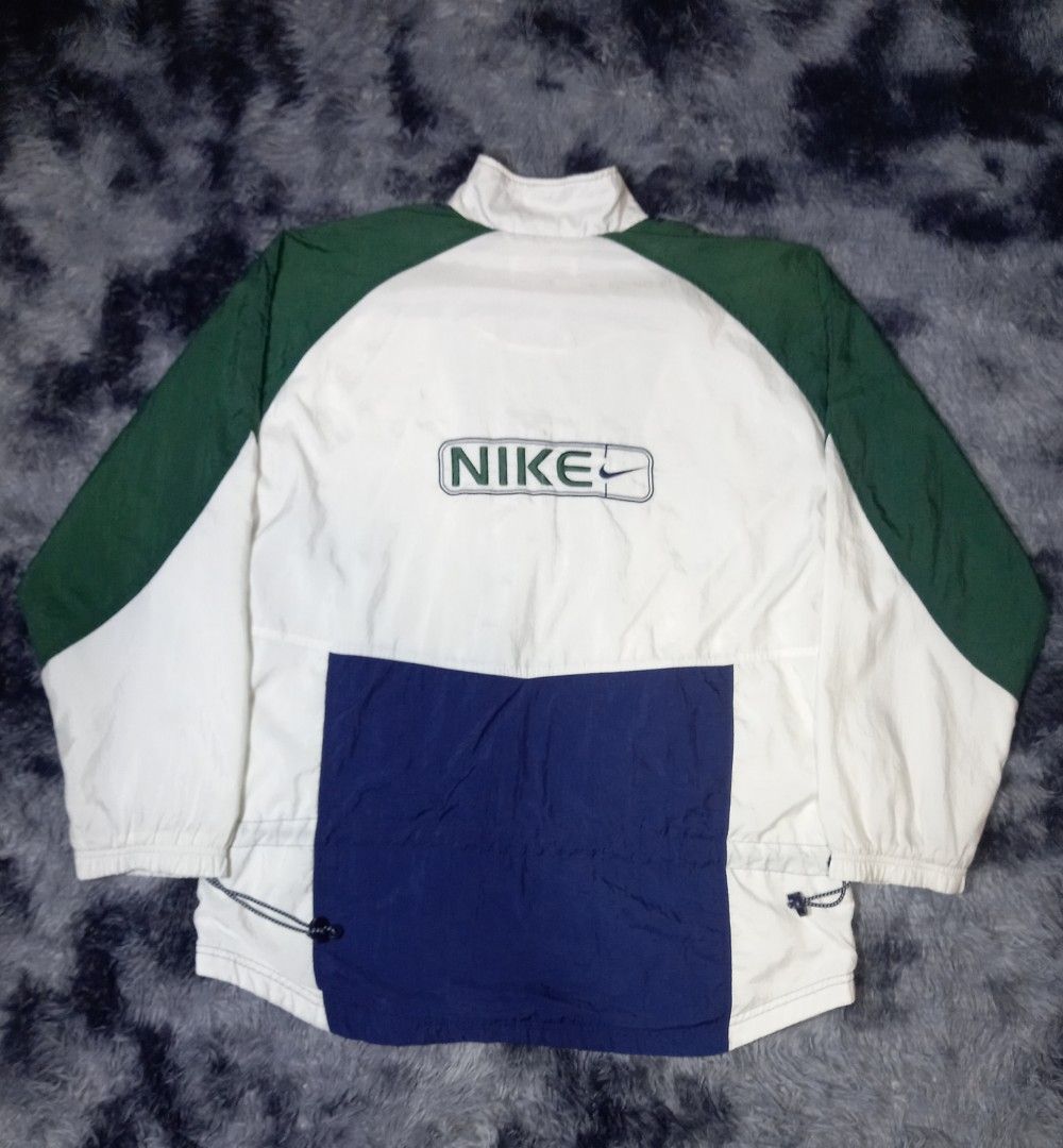 vintage 90s Nike windbreaker (Category: Coats, Jackets and Outerwear) located in Manila. Submitted by thirdy. (Listing ID 1441903298, Image 2). Description: -Made best offer na lng po sa interested salamat po -Youth size L on tag (12-14) -Dimes (26 X 30) -Very good condition.