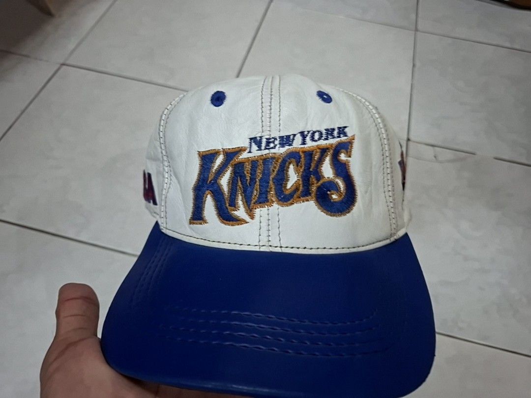 VINTAGE NEW YORK KNICKS LEATHER SNAPBACK HAT (Category: Caps & Hats) located in Makati City. Submitted by clyde_coleen (Listing ID 1441845432, Image 1). Description: VINTAGE NEW YORK KNICKS JH DESIGN BY JEFF HAMILTON VINTAGE LEATHER HAT condition rate: 9.5/10 condition: excellent issue: sign of usage due to its age rfs: need cash mop: gcash NO COD OR COP additional ship fee ALL SALES are FINAL, NO RETURNS buy with confidence! details are based on