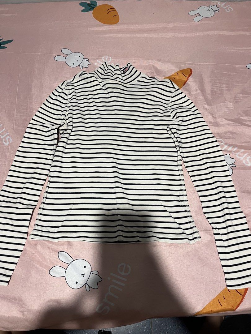 Vintage Ralph Lauren Striped Turtleneck (Category: Longsleeves) located in Manila. Submitted by hi_abbd (Listing ID 1441949802, Image 1). Description: - Classic striped turtleneck top - Brand: Polo Jeans Co. Ralph Lauren - Material: 100% Cotton - Features: Iconic RL logo tag on collar - Size: XS - Condition: Small, faint stain on front (see second photo) - Style: Perfect for layering or wearing solo.
