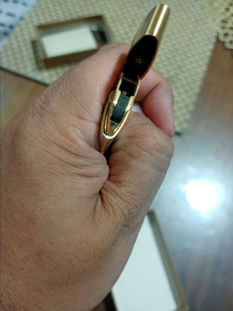 Vintage Windmill Gold-Tone Gas Lighter (Category: Vintage Collectibles) located in Mandaluyong City. Submitted by adriandelacruz3840 (Listing ID 1441830188, Image 3). Description: Vintage Windmill Gold-Tone Gas Lighter For sale: An authentic vintage pocket gas lighter by Windmill. It features a beautifully curved, ergonomic semi-oval shape and a sleek satin/matte gold-tone finish. It has a horizontal roller wheel design beneath the cap flip line 