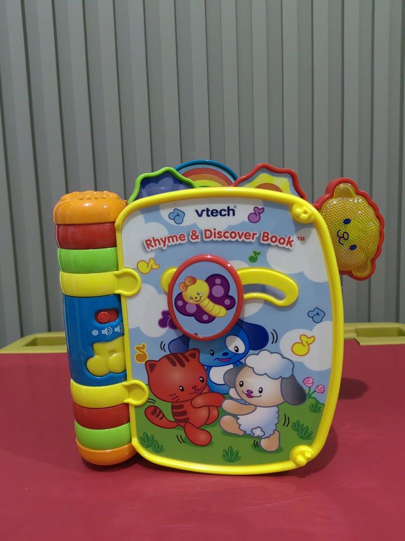VTech Rhyme & Discover Book - Interactive Learning Toy (Category: Educational & Learning Toys) located in Tagaytay City. Submitted by mrskai (Listing ID 1441902987, Image 1). Description: - Interactive VTech Rhyme & Discover Book - Teaches popular nursery rhymes (e.g., Twinkle Twinkle Little Star) - Features colorful pages with engaging illustrations and sounds - Includes spinning element and textured pages for sensory play - Ideal for babies and