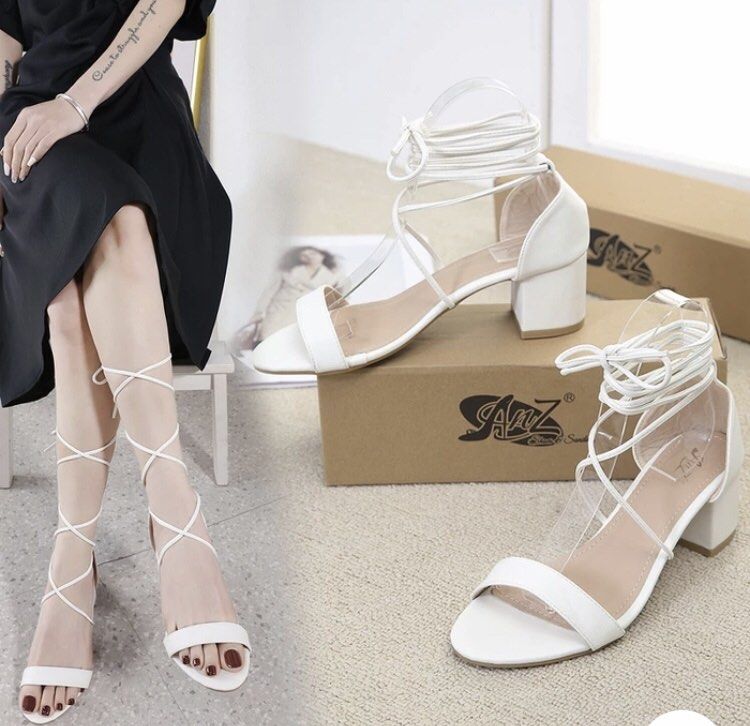 White Lace-Up Block Heels Elegant Sandals (Category: Heels) located in Santa Rosa. Submitted by luckycat18 (Listing ID 1441833332, Image 1). Description: - White block heel sandals - Lace-up straps tie around ankle and calf - Open toe and elegant design - Comfortable heel height for walking - Perfect for dressing up dresses or skirts - Perfect for formal occassions or even casual wear depends on outfit.