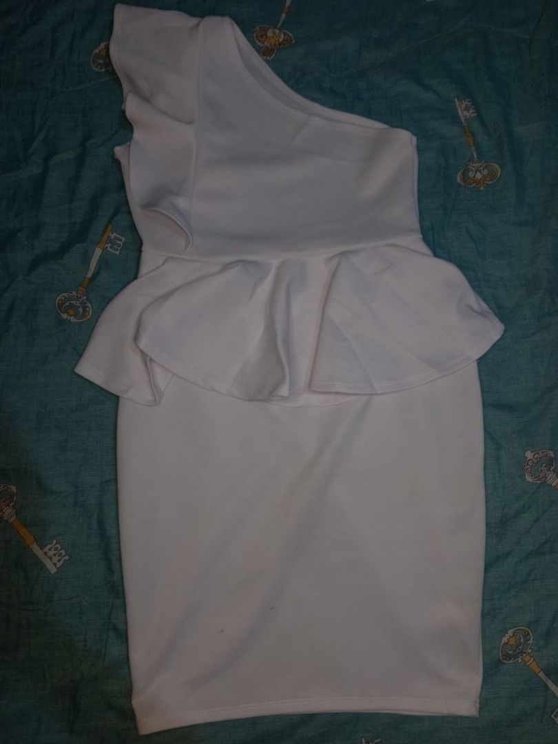 White One Shoulder Peplum Ruffle Dress (Category: Dresses) located in Marikina City. Submitted by gelandmeridor_015 (Listing ID 1441789533, Image 3). Description: - White one-shoulder dress - Features a peplum waist - Ruffle detail on the shoulder - Knee-length - Ideal for parties or nights out - Comfortable and stylish fabric - Can fit s-m.