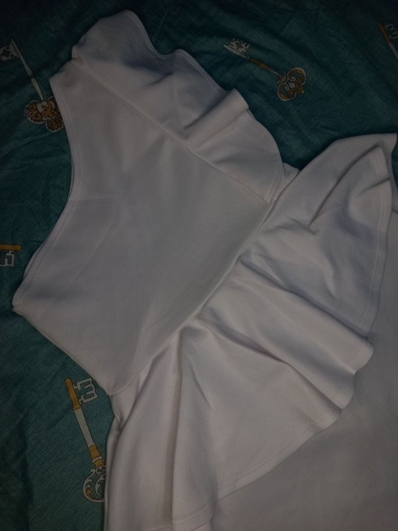White One Shoulder Peplum Ruffle Dress (Category: Dresses) located in Marikina City. Submitted by gelandmeridor_015 (Listing ID 1441789533, Image 2). Description: - White one-shoulder dress - Features a peplum waist - Ruffle detail on the shoulder - Knee-length - Ideal for parties or nights out - Comfortable and stylish fabric - Can fit s-m.
