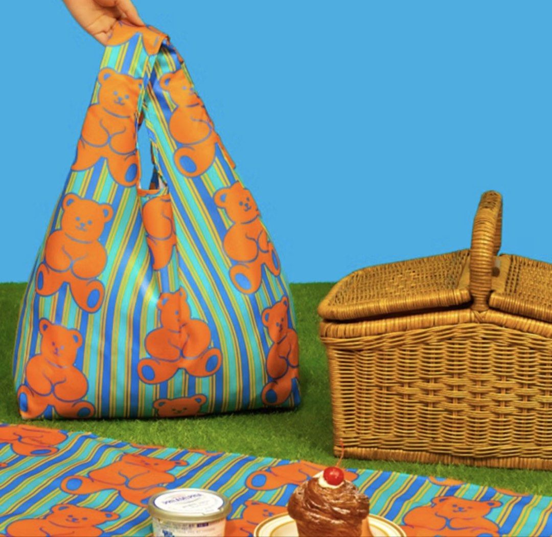 Wiggle Wiggle Teddy Bear Picnic Bag Large (Category: Tote Bags) located in Pasig City. Submitted by thetravellingguyinstyle (Listing ID 1441929898, Image 2). Description: - Adorable Wiggle Wiggle picnic bag - Foldable - Features a cute teddy bear print and colorful stripes - Large size, ideal for outings - Easy to fold and carry - Brand new.