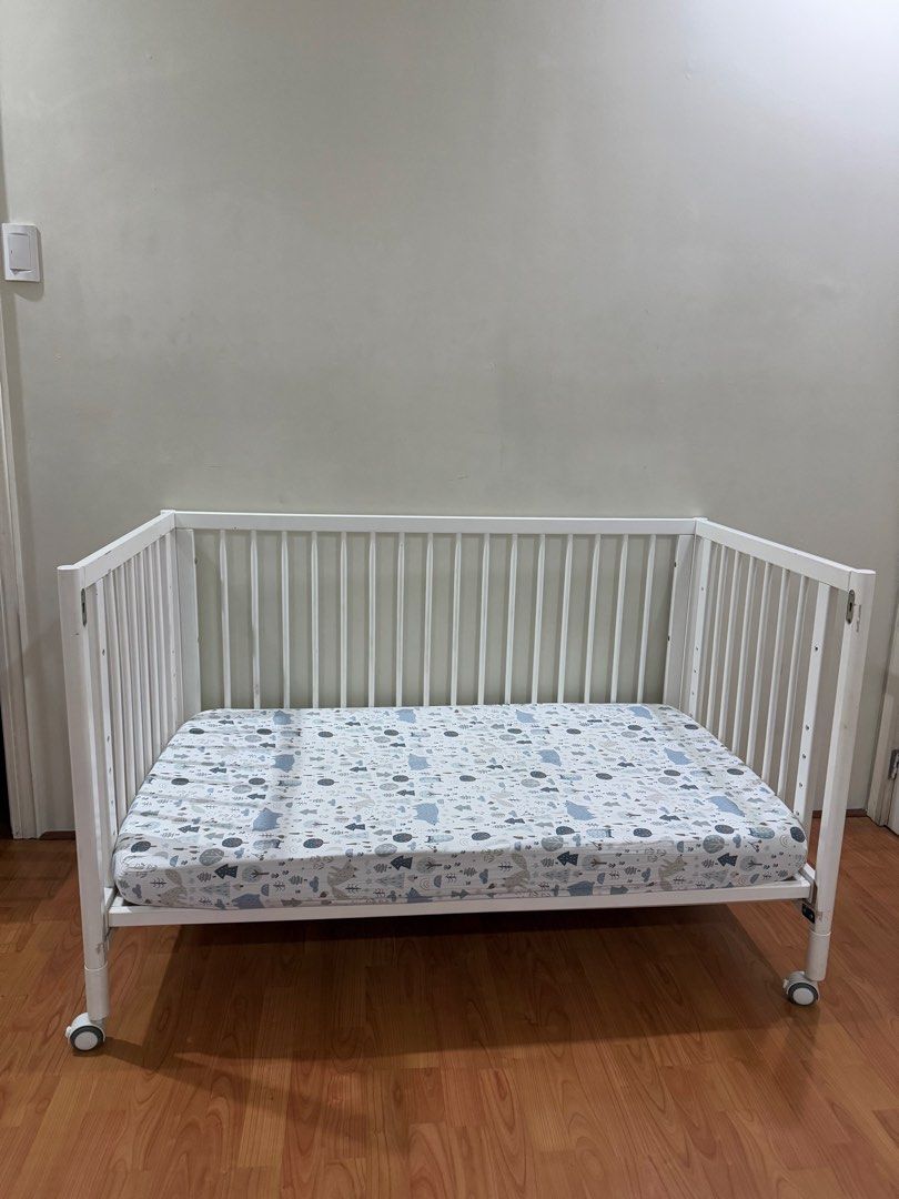 Convertible Crib with free mattress (Category: Cots & Cribs) located in Marikina City. Submitted by babycluttermatter (Listing ID 1441932482, Image 2). Description: -Lily and Tucker Convertible Crib -Material: Pinewood -Free mattress —size: 52x28 inches (standard size) -Bought for P16,500 -Already disassembled.