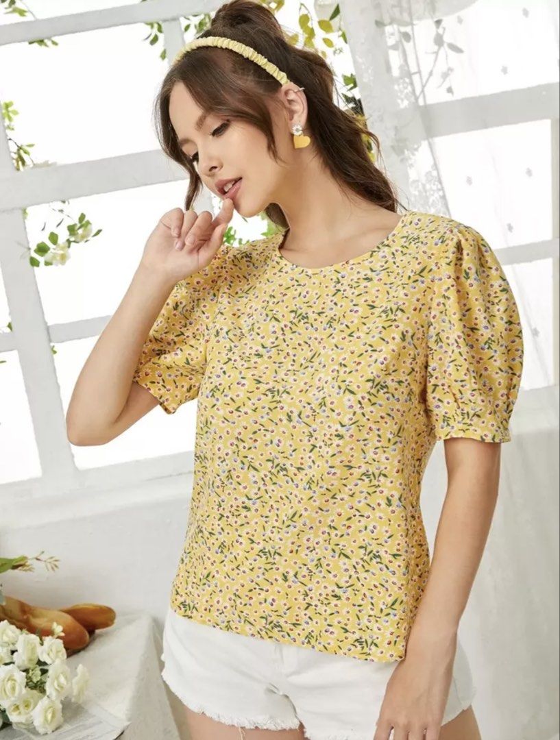 Yellow Floral Puff Sleeve Top (Category: Blouses) located in Makati City. Submitted by cee_store (Listing ID 1441884332, Image 3). Description: - Adorable yellow top with a charming ditsy floral print. - Features stylish puff sleeves for a feminine touch. - Classic round neckline. - Versatile: Looks great with shorts or jeans. - Perfect for casual outings, picnics, or everyday wear. - Made from lightweight and comfortable fabric..