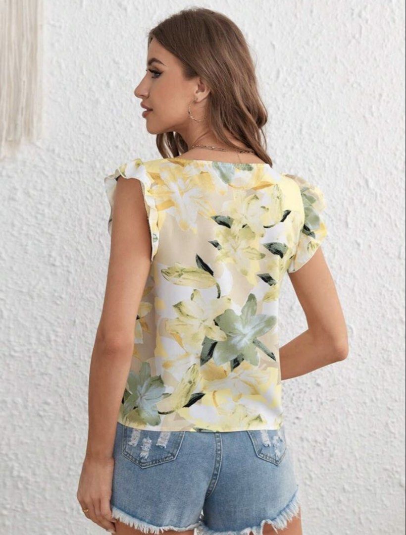 Yellow Floral Square Neck Ruffle Sleeve Top (Category: Blouses) located in Makati City. Submitted by cee_store (Listing ID 1441886335, Image 2). Description: - Adorable yellow top with a charming floral print. - Features a stylish square neckline. - Pretty ruffled sleeves add a feminine touch. - Lightweight and breezy fabric, ideal for hot weather. - Versatile: looks great with shorts or jeans. - Easy to dress up or down for any occasion..