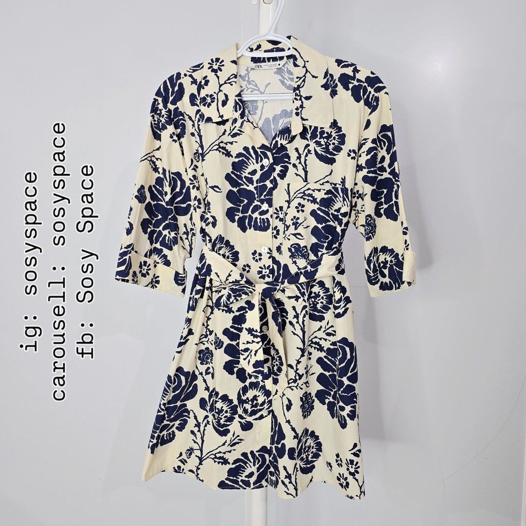 Zara Floral Mini Dress (Category: Dresses) located in Lucena. Submitted by sosyspace (Listing ID 1441878425, Image 1). Description: Z. A. R. A. 05B2P71 The Lory Dress Cream Base + Navy Blue Floral Print Button Down MIni Shirt Dress Collared Neckline With Self-tie Waist Belt 3/4 sleeves 100% Cotton Size: US XXL Condition: PRE-OWNED LIKE NEW Washed but never worn. Price: Php 1,800 + HF + SF (Best Price Already. No More Haggling Please!😘) ------- M