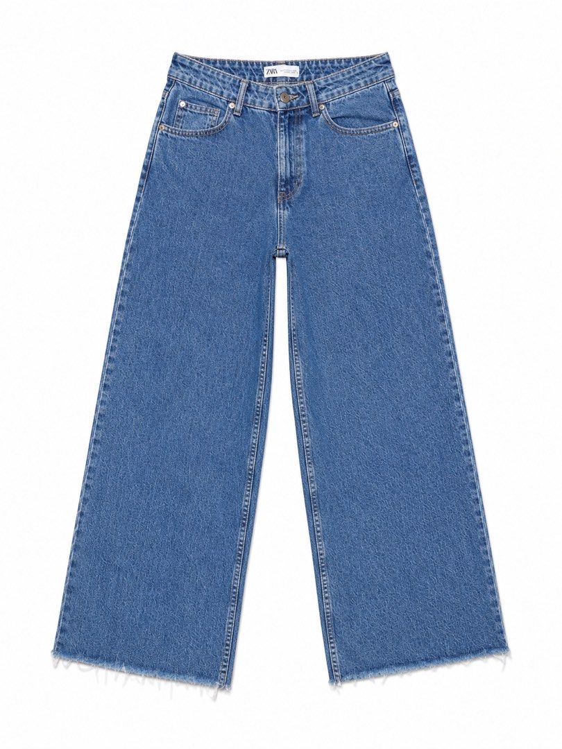 ZARA Wide Leg Cropped Jeans (Category: Jeans) located in Makati City. Submitted by lekrizstudio (Listing ID 1441911687, Image 2). Description: - Brand: ZARA - Style: Wide leg, cropped denim jeans - Features: Frayed hem, button and zip closure, two back pockets - Size: EUR 32 (USA 00, MEX 22) - Measurements: Waist approx. 13 inches (flat), Inseam approx. 25-26 inches - Good condition Important Notes: *** Sold as is. No returns, no refunds, and no 