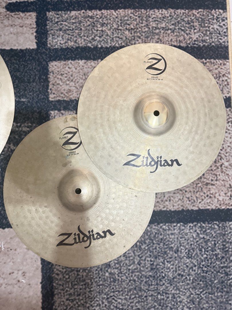 Zildjian Planet Z Drum Cymbal Set (Category: Musical Instruments) located in Caloocan City. Submitted by lorenz.alberttt (Listing ID 1441809375, Image 2). Description: - Zildjian Planet Z Cymbal Set -Inclusions -Crash -Crash ride -Ride -HiHat top & bottom -With gig bag (issue: zipper).