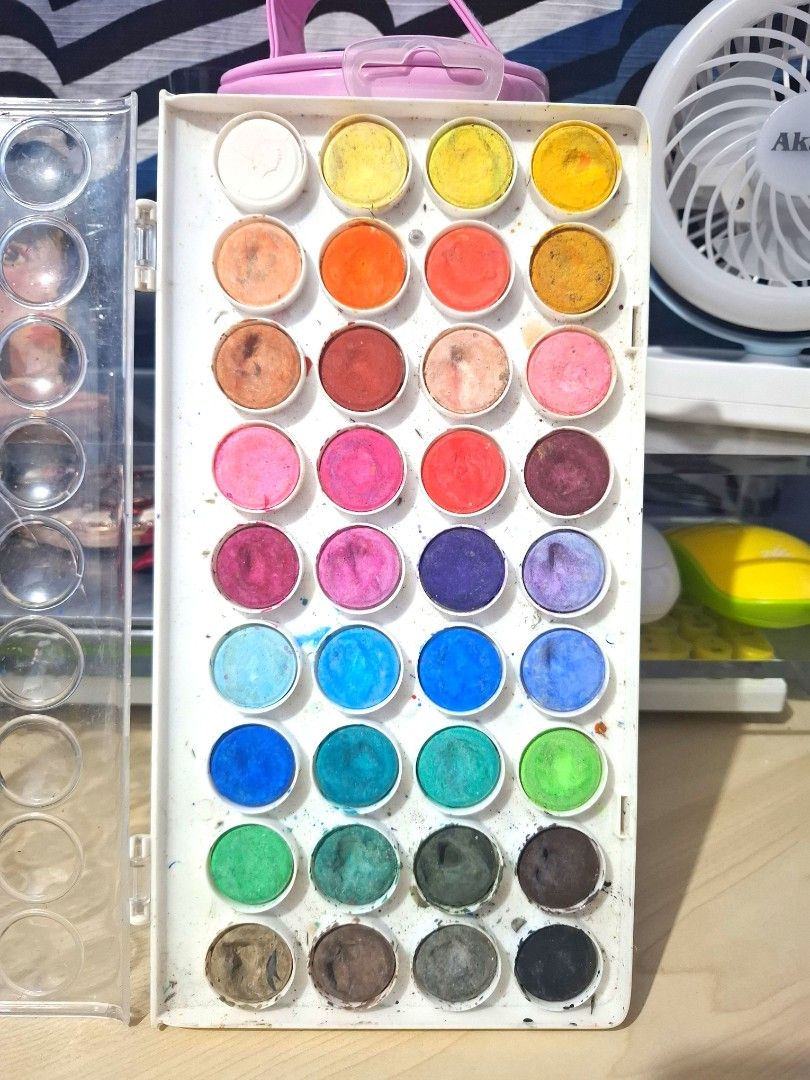 36 Color Watercolor Paint Set (Category: Stationery & School Supplies) located in Quezon City. Submitted by ana-chan (Listing ID 1442141650, Image 3). Description: 36-color watercolor paint set with brush. Some colors used. Portable case. Good for all skill levels. used once .