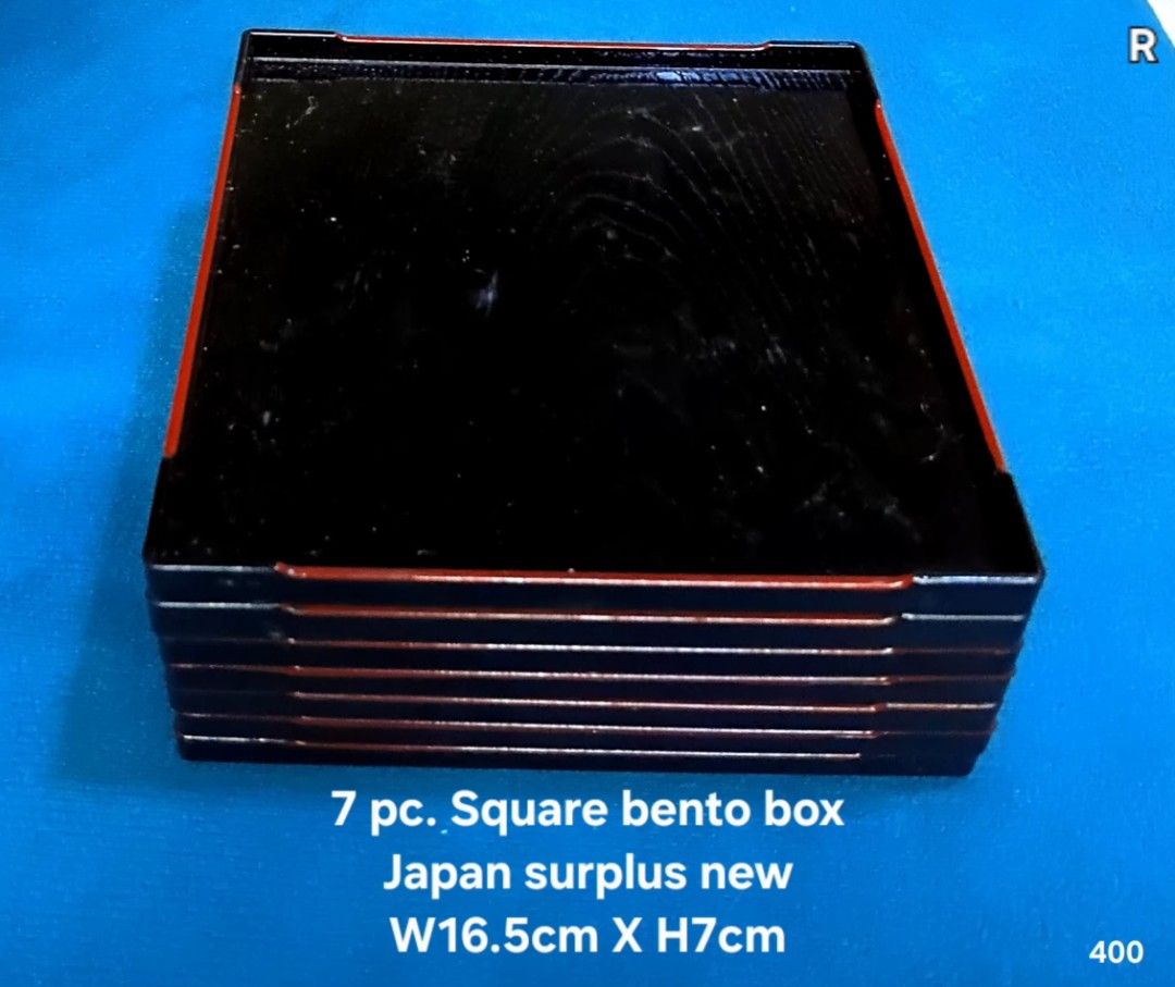 7 pc. Square Bento plates, Japan Surplus, Black (Category: Food Organization & Storage) located in Manila. Submitted by osc2026 (Listing ID 1442099434, Image 1). Description: - Set of 7 square bento plates - New, surplus from Japan - Color: Black with red trim - Dimensions: W16.5cm x H7cm - Ideal for meal prep and picnics.