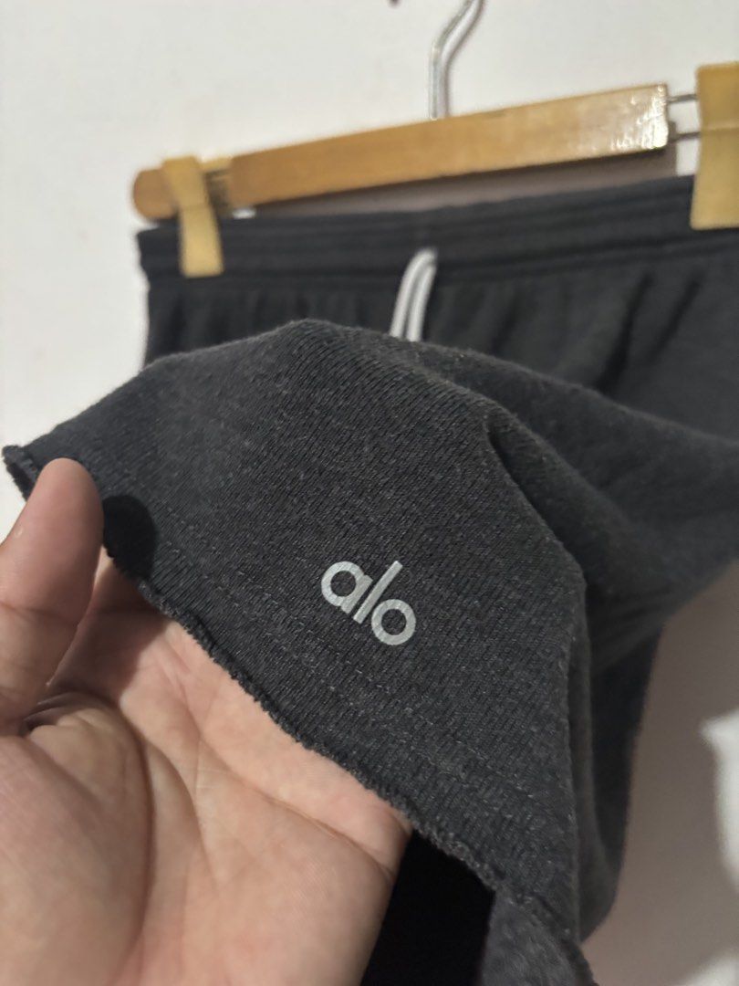 Alo Yoga Grey Sweat Shorts (Category: Activewear) located in Subic. Submitted by thriftpoison (Listing ID 1442016699, Image 3). Description: - Grey sweat shorts from Alo Yoga - Elastic waistband with drawstring - Comfortable and casual, ideal for lounging or workouts - Features Alo logo on the left leg - Raw hem detail - Small on tag - Waist 30-36 Length 15 .