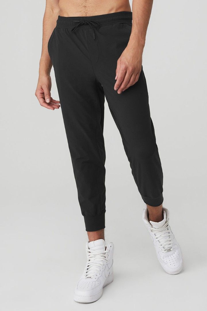 Alo Yoga Unisex Movement Pants Joggers S Charcoal Grey (Category: Other Bottoms) located in Singapore. Submitted by bigbangsale (Listing ID 1442035925, Image 2). Description: - Brand: Alo Yoga - Color: Charcoal Grey - Size: S/P - Features: Elastic waistband with drawstring, cuffed ankles, side zippered pocket - Versatile: Great for workouts or casual wear - Light nylon material Please note the flaw on the tie string hence selling cheaper, but doe