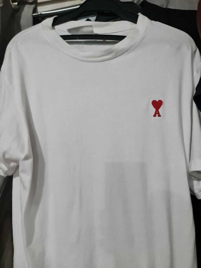 AMI Paris White T-shirt (Category: Tshirts & Polo Shirts ) located in Quezon City. Submitted by 1apollo (Listing ID 1442125825, Image 2). Description: - Authentic AMI Paris white t-shirt - 21x29 dimes.