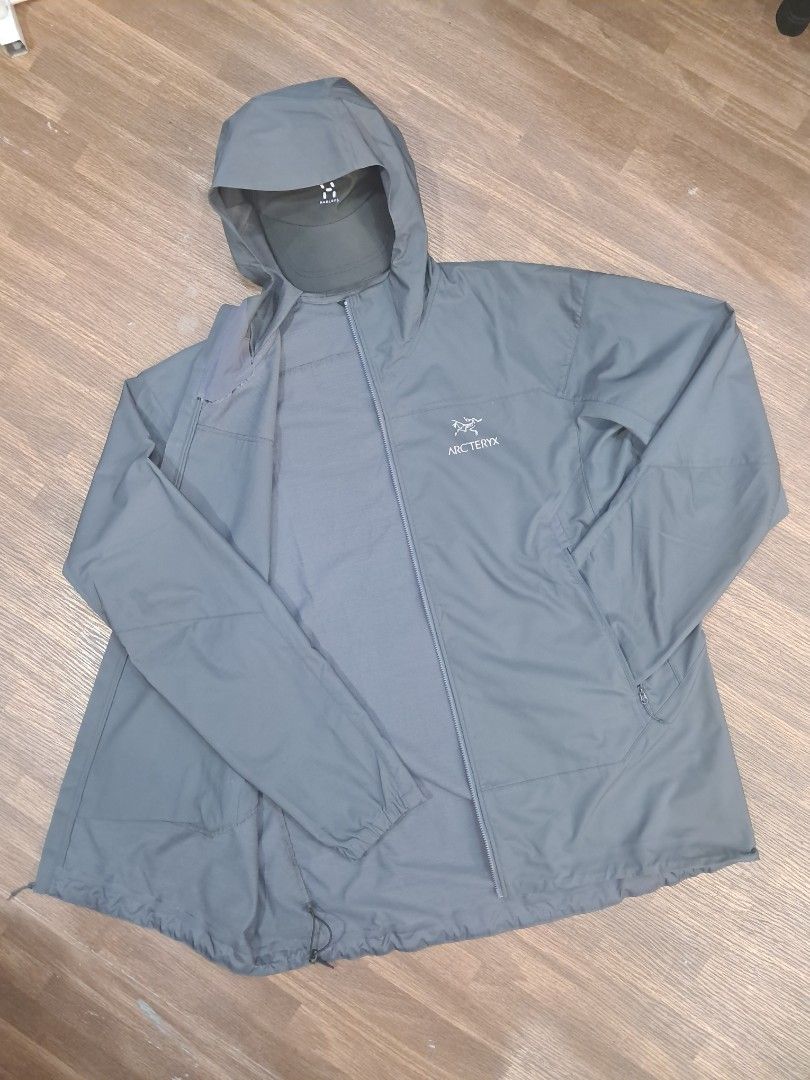 Arc'teryx Nodin Hooded Windbreaker Jacket (Category: Coats, Jackets and Outerwear) located in Baguio. Submitted by floss31172840 (Listing ID 1442117818, Image 3). Description: - Grey Arc'teryx hooded jacket - Lightweight and packable design - Full zip front with convenient pockets - Elasticated cuffs and hem for a snug fit - Perfect for outdoor adventures or casual everyday wear.