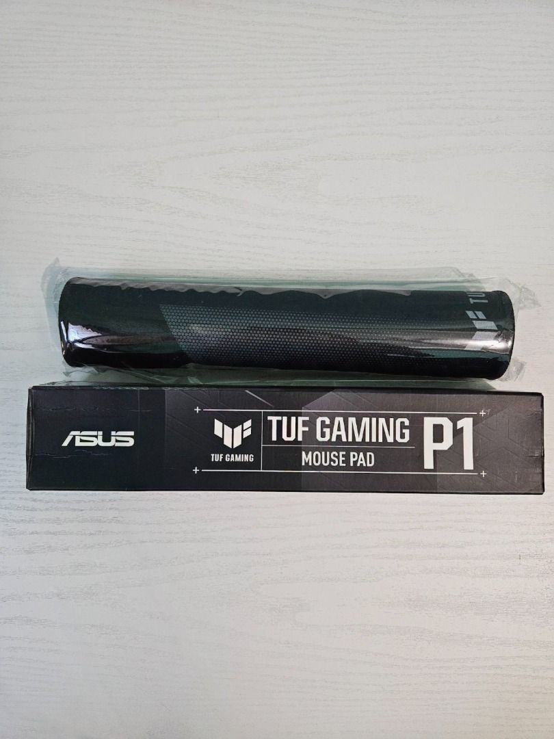 ASUS TUF Gaming P1 Mouse Pad (Category: Mouse & Mousepads) located in Davao. Submitted by terrence.maramento (Listing ID 1441993245, Image 3). Description: I am selling it as it is wide for my desk and takes up space. Nevertheless, it has barely been used (around twice only for testing how it would feel). Its quality is as good as new. - ASUS TUF Gaming P1 Mouse Pad - Portable 36x36cm size - Military-grade nano-coating - Water-resistant surface -