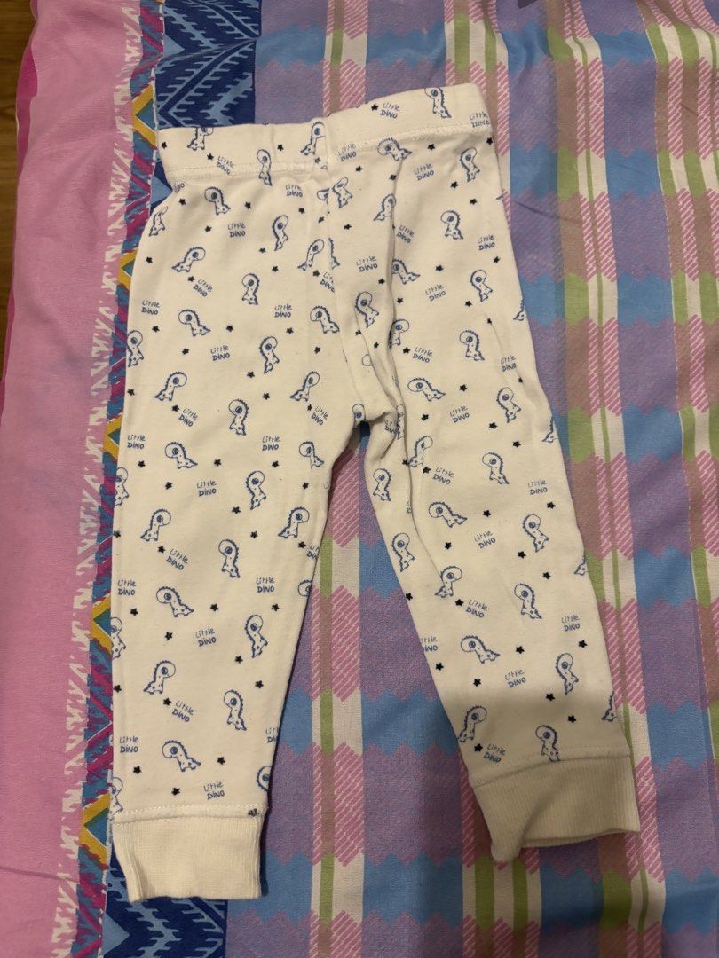 Baby Onesies and Pants Set (Category: Babies & Kids Fashion) located in Pasig City. Submitted by dianexing (Listing ID 1442141715, Image 3). Description: - Bundle of 3 baby clothes - Includes: grey short-sleeve onesie, black 'New Zealand' onesie (fern print), white pants ('Little Dino' print) - Ideal for everyday wear - All items are clean and ready for a new home.