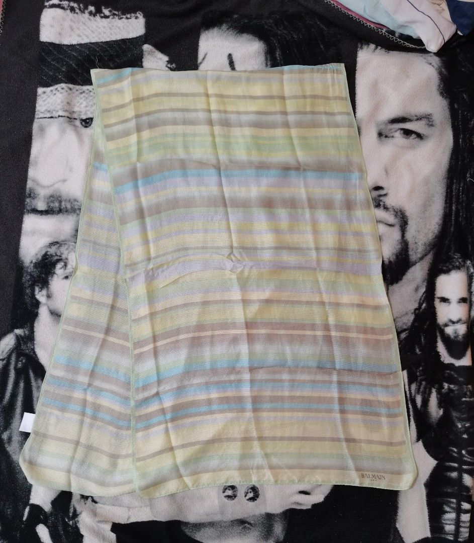 Balmain Paris Striped Scarf (Category: Scarves) located in Santa Cruz. Submitted by oddpenguin-4575 (Listing ID 1441999104, Image 2). Description: 📌.....P L E A S E R E A D..... 📌measurement:L-67.5"/W-21" 📌color-9/10 📌Brand:Balmain 📌issue:with light storage stain,snags and loose stitch but barely noticeable pls. see photos 📌- Authentic Balmain Paris scarf - Chic pastel stripe pattern - Lightweight and airy material for comfort - Versatile a