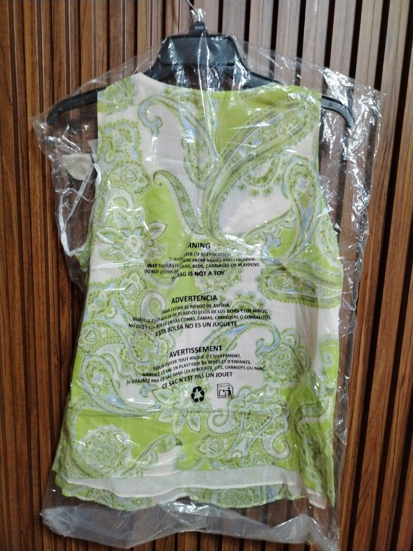 BCBG sleeveless blouse (Category: Sleeveless) located in Cavite. Submitted by oncetop_declutter (Listing ID 1442116446, Image 2). Description: brand new with hangtag Sf c/O buyer.