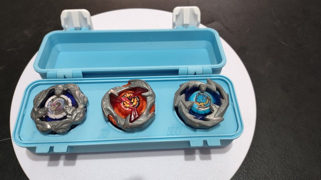Beyblade X Case - Light Blue (Category: Action & Battle Toys) located in Iloilo. Submitted by kitekrafty (Listing ID 1441987442, Image 3). Description: - Comes with a light blue Beyblade X case. - Case securely holds up to three Beyblades. - Case snaps shut for secure storage and transport. - Perfect for organizing and taking your Beyblades on the go. - Beyblades not included.