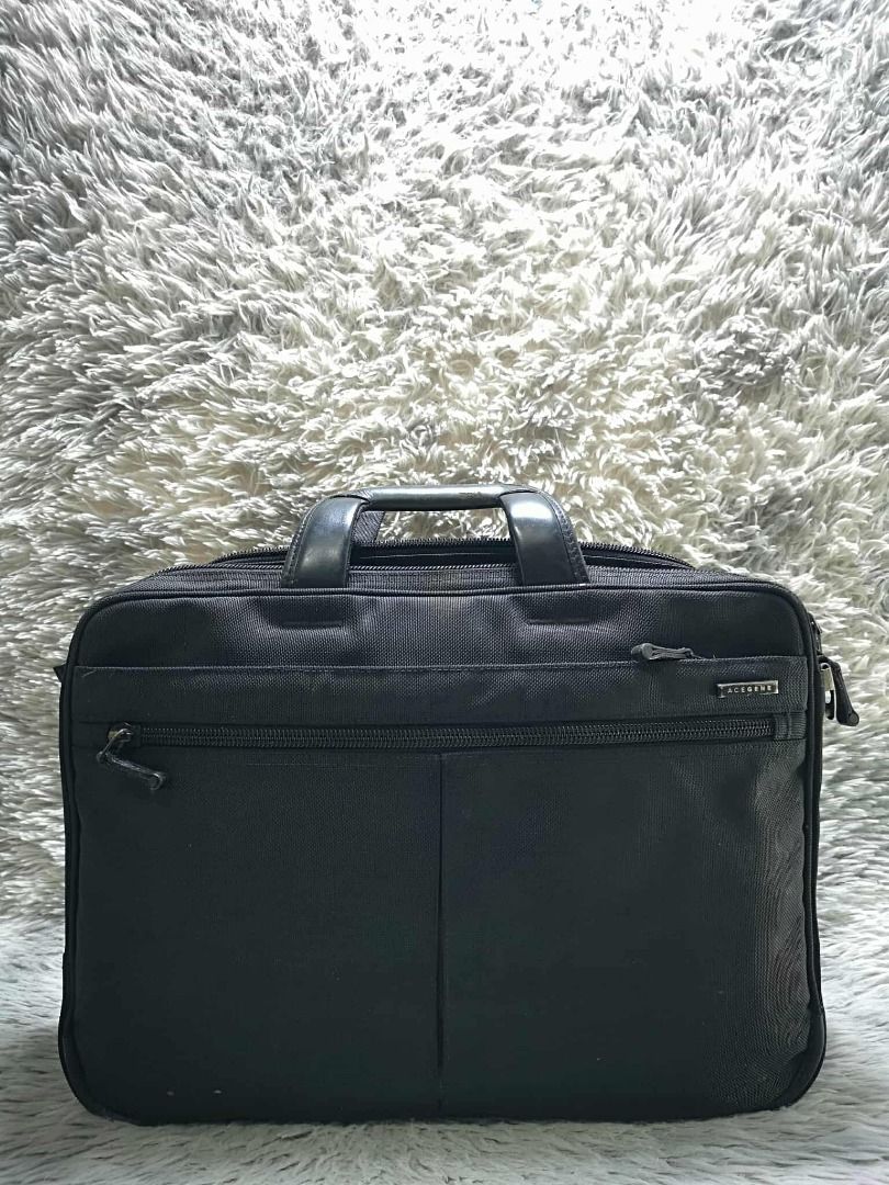 Black Laptop Bag With Front Pockets (Category: Laptop Bags & Sleeves) located in Santa Cruz. Submitted by jmy_surplus.2 (Listing ID 1441989732, Image 3). Description: Size ; L - 14 W - 19 Color ; Black Type ; Laptop Bag Brand ; No brand Material ; Nylon Style ; Black Zipper Closure Laptop bag LR 6 JMY 4 Batch #207.