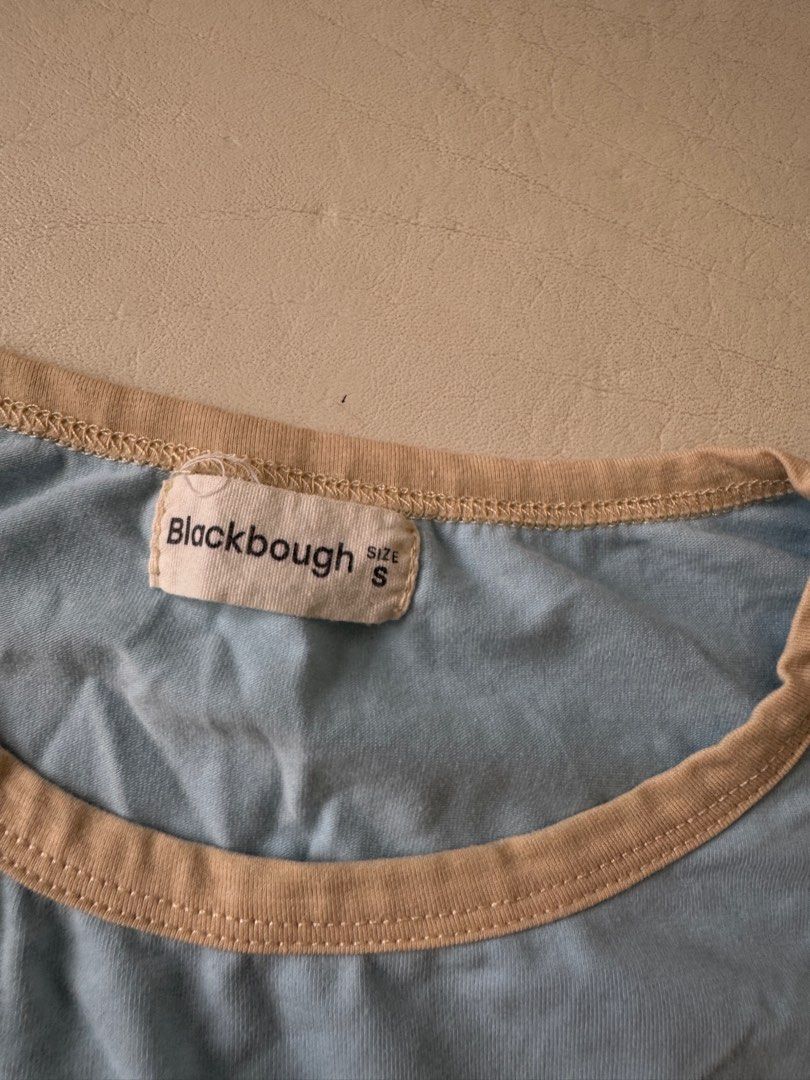 Blackbough Baby Tee Lemon Print Blue Size S (Category: Shirts) located in Las Pinas. Submitted by materialgowrl (Listing ID 1442067791, Image 2). Description: - Brand: Blackbough - Style: Baby Tee - Color: Light Blue - Print: Lemon and Floral - Trim: Tan neckline and sleeves - Size: S - Perfect for summer vibes.