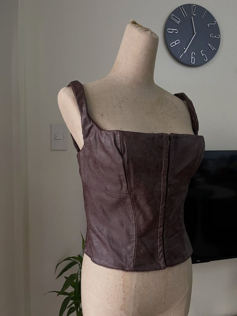 Brown Leather Corset (Category: Sleeveless) located in Pasig City. Submitted by threadhumore (Listing ID 1442120006, Image 1). Description: House of CB Size Available: [on tag] (2) XS B 30” W 24” (4) Small B 32” W 26” (1) Medium B 34” W 28” (1) Large B 40” W 32” Condition: 9/10 minimal flaw.