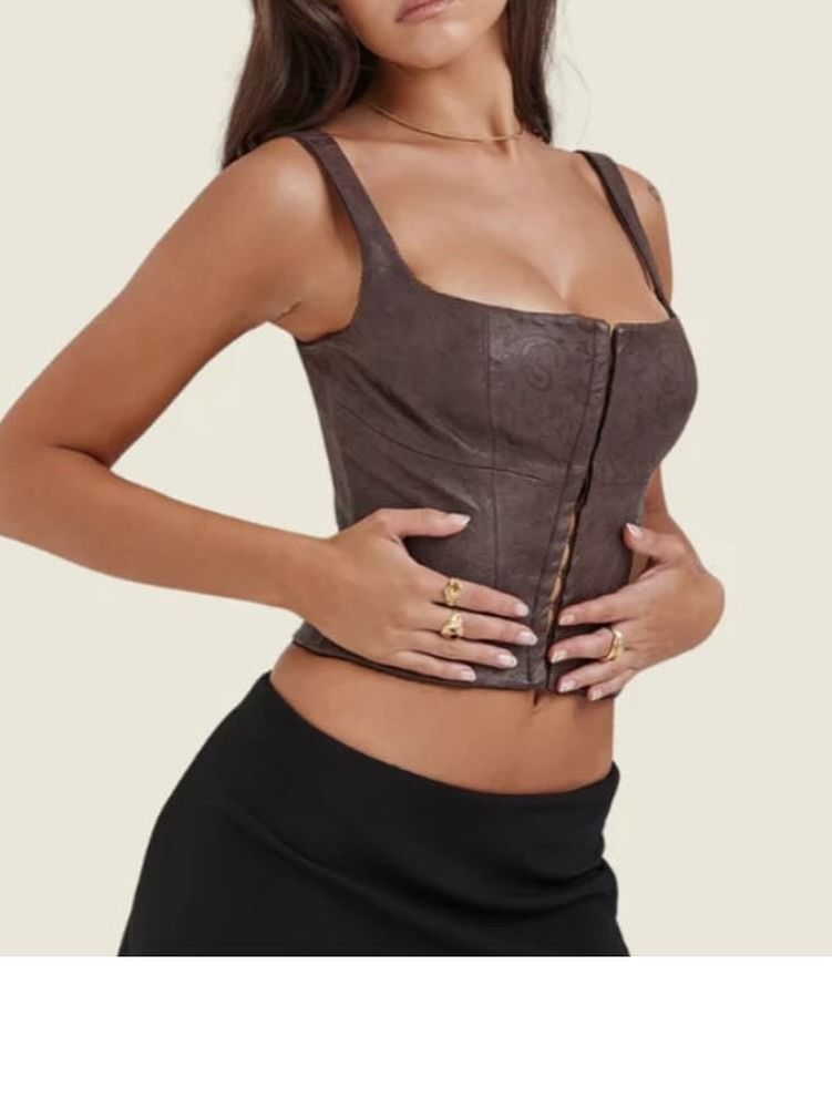 Brown Leather Corset (Category: Sleeveless) located in Pasig City. Submitted by threadhumore (Listing ID 1442120006, Image 2). Description: House of CB Size Available: [on tag] (2) XS B 30” W 24” (4) Small B 32” W 26” (1) Medium B 34” W 28” (1) Large B 40” W 32” Condition: 9/10 minimal flaw.