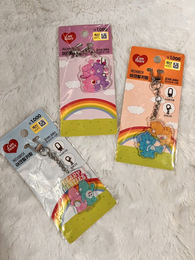 Care Bears Acrylic Keychains (Category: Character Goods) located in Quezon City. Submitted by cthy27 (Listing ID 1442038481, Image 1). Description: - adorable Care Bears acrylic keychains. - Features unique Care Bear characters and designs. - Each keychain includes a charming rainbow and cloud motif. - Equipped with a durable metal clasp and chain. - Ideal for personalizing bags, backpacks, or keys. - A must-have collectible for any Care Bears en