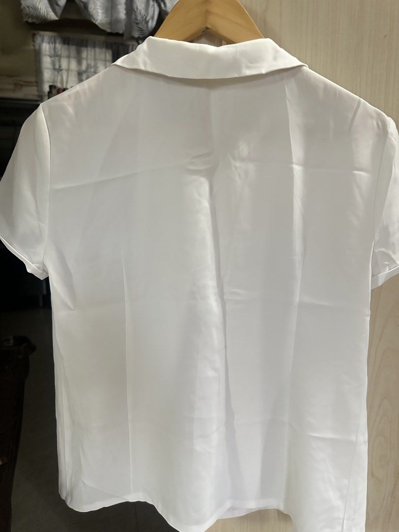 CC Club White Short Sleeve Button Up Blouse (Category: Blouses) located in Valenzuela. Submitted by _minchin (Listing ID 1442110041, Image 2). Description: - White short sleeve blouse - Brand: CC Club - Button-up front with collar - Light stains on the inside of the neck area (please check photos) but washable - Suitable for school or work.