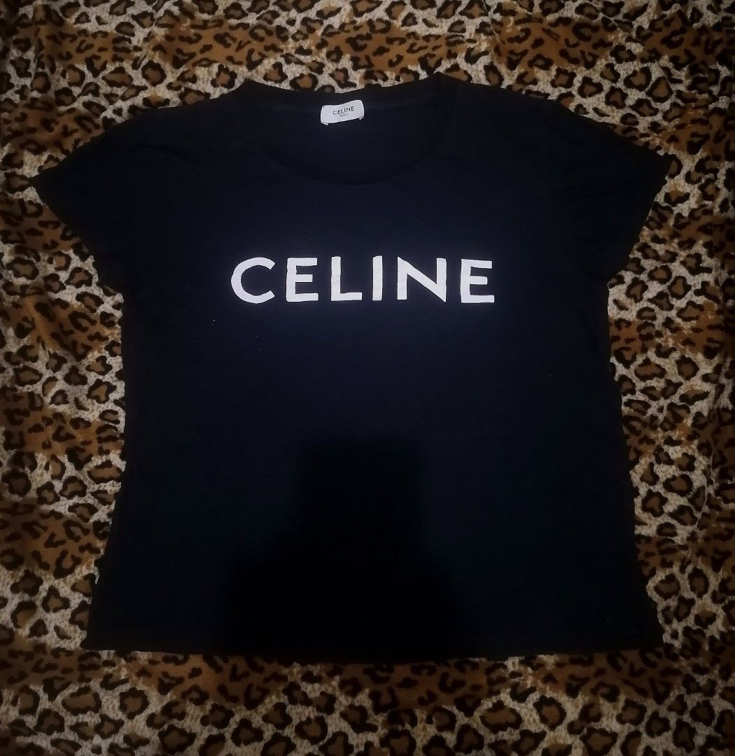 Celine Paris Logo T-Shirt Size L (Category: Shirts) located in Cebu City. Submitted by roadthrift (Listing ID 1442010463, Image 1). Description: - Black Celine Paris T-shirt - Size: L - Material: 100% Cotton - Made in Italy - Classic and versatile staple piece - Ideal for everyday wear.