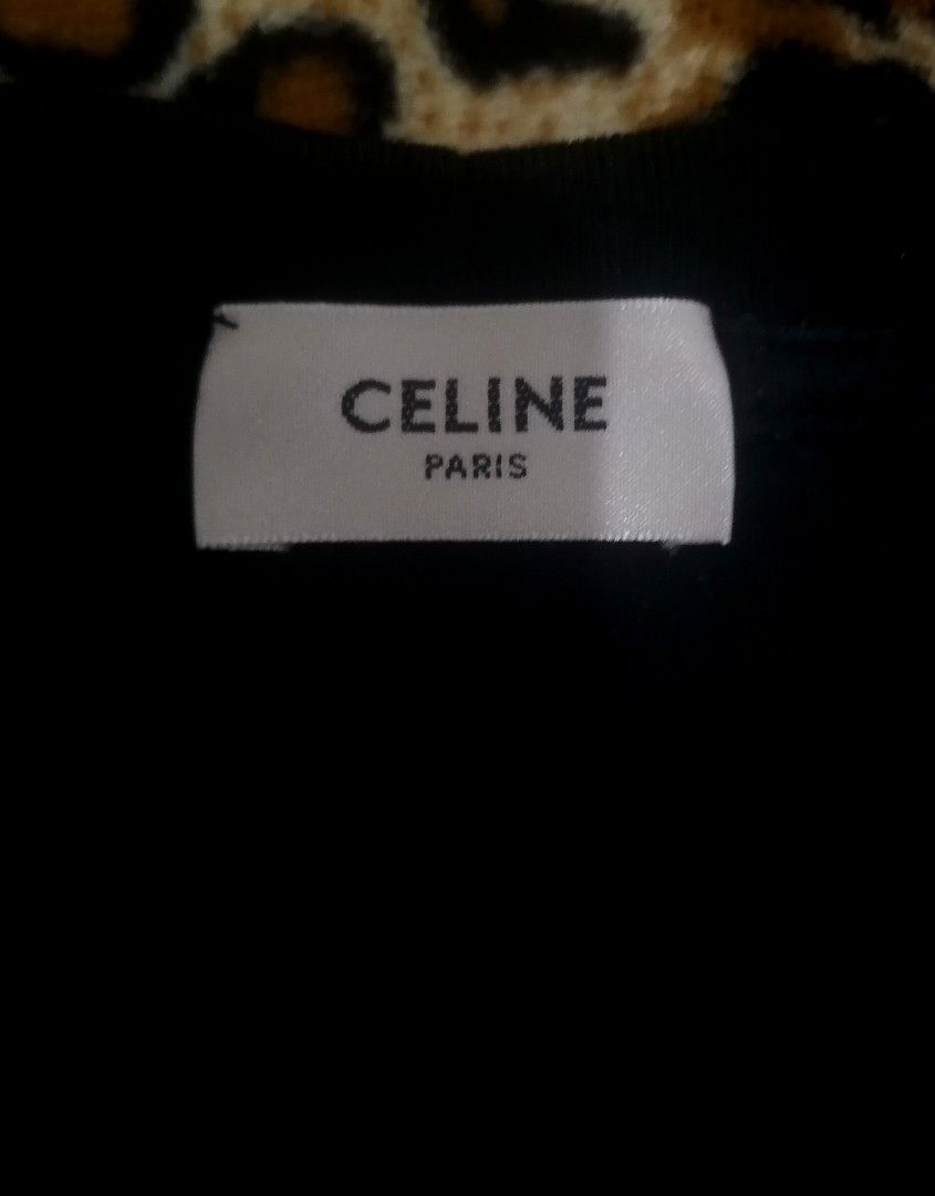 Celine Paris Logo T-Shirt Size L (Category: Shirts) located in Cebu City. Submitted by roadthrift (Listing ID 1442010463, Image 2). Description: - Black Celine Paris T-shirt - Size: L - Material: 100% Cotton - Made in Italy - Classic and versatile staple piece - Ideal for everyday wear.