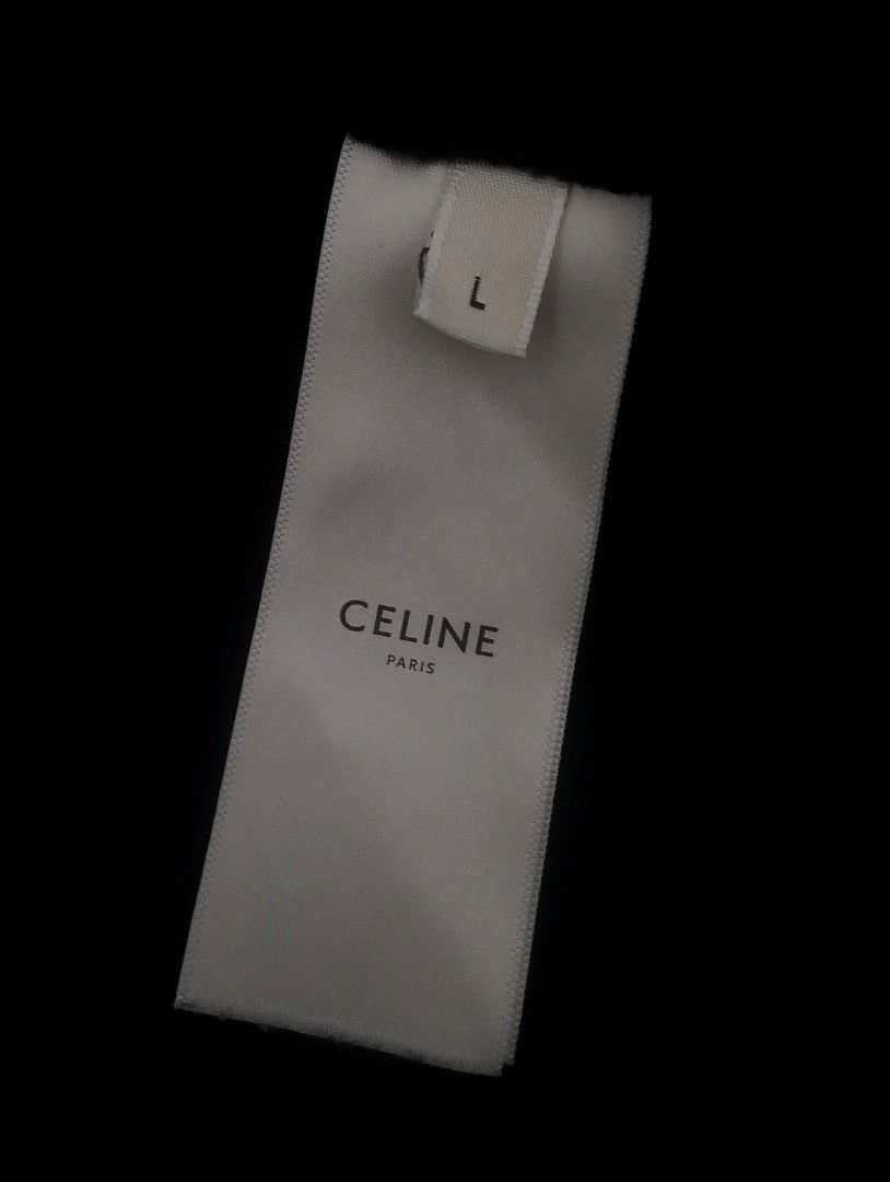 Celine Paris Logo T-Shirt Size L (Category: Shirts) located in Cebu City. Submitted by roadthrift (Listing ID 1442010463, Image 3). Description: - Black Celine Paris T-shirt - Size: L - Material: 100% Cotton - Made in Italy - Classic and versatile staple piece - Ideal for everyday wear.
