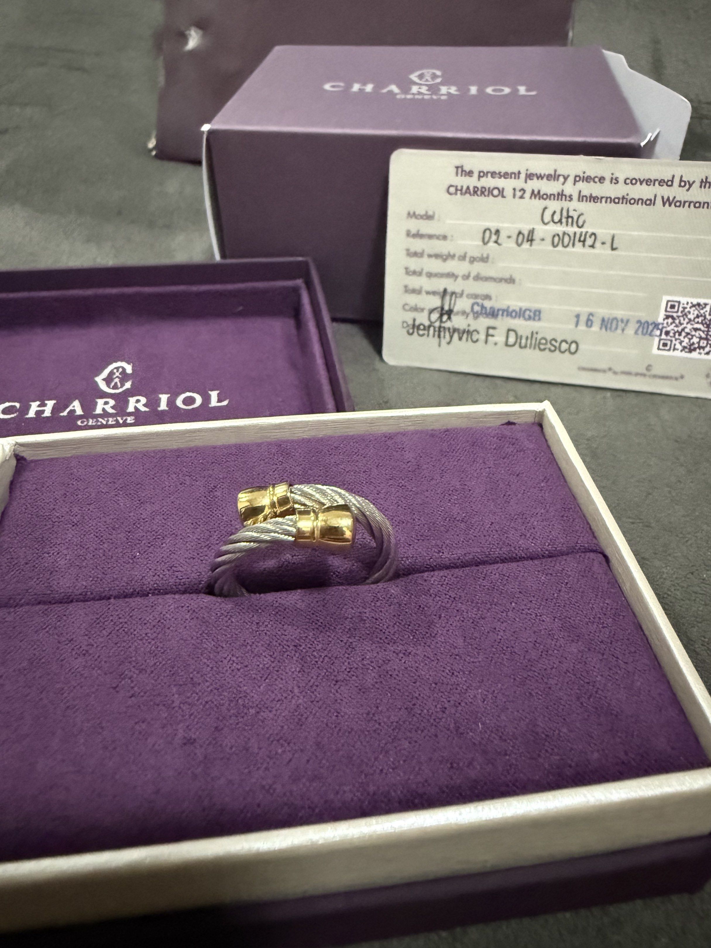 Charriol Geneva Celtic Ring Gold & Steel Cable Design (Category: Rings) located in Santa Rosa. Submitted by jdoria (Listing ID 1442037162, Image 3). Description: PLEASE ASK FOR SELLER OR ITEM INFO FIRST BEFORE MAKING AN OFFER. - Authentic Charriol ring from the Celtic collection. Large Size - Features the signature twisted steel cable design. - Accented with gold details. - Comes with original box and warranty card. - Excellent addition to your j