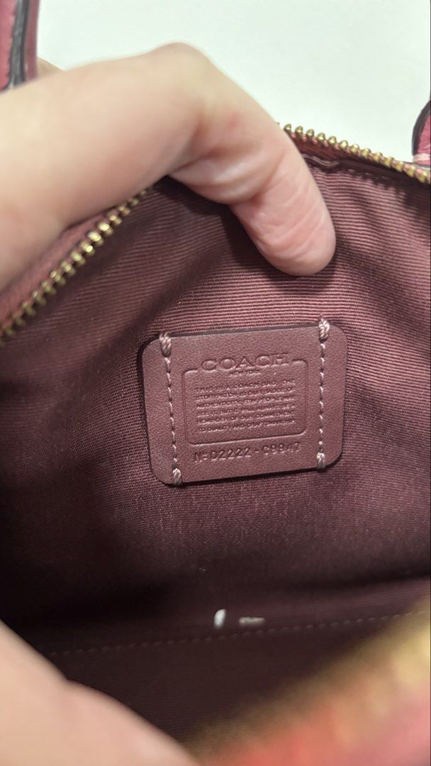 Coach mini rowan (Category: Luxury Bags & Wallets) located in Quezon City. Submitted by aloracollections_ (Listing ID 1442007624, Image 3). Description: fadings hole inside Stain back Check our available items here https://drive.google.com/drive/folders/1Fm-xqjusIe9icyxxRMh7usLeod7pN-fr.