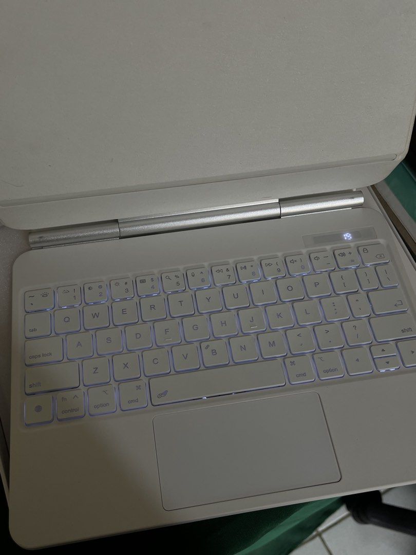 DANYCASE Magnetic Keyboard Case for iPad (Category: Cases & Sleeves) located in Manila. Submitted by gutierrezaaquisha (Listing ID 1442008616, Image 3). Description: - JANYCASE magnetic suspension keyboard case - White color - Backlit keyboard for enhanced visibility - Built-in stylus slot - Includes operation instructions and charging cable - Ideal for productivity on the go used once, impulsive buy lang for 11th gen A16 ipad.