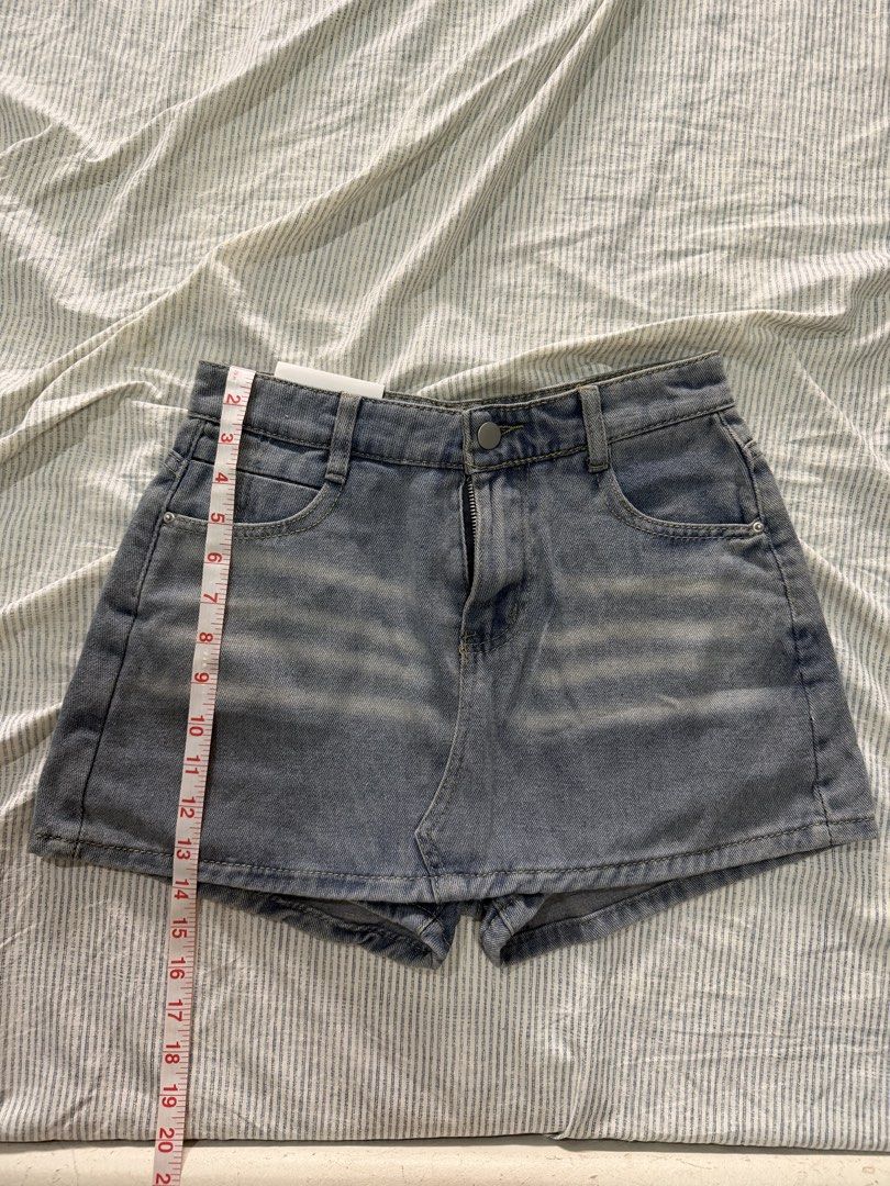 Fashion Jeans Denim Skort - Blue (Category: Shorts) located in Manila. Submitted by mento.ph (Listing ID 1442035321, Image 2). Description: - Brand: Fashion Jeans - Color: Blue Denim - Style: Classic, slightly faded wash - Features: Front and back pockets, button and zip closure - Ideal for: Casual wear - Approximate Measurements: 14" length, 26" waist - would best fit S-M frame.