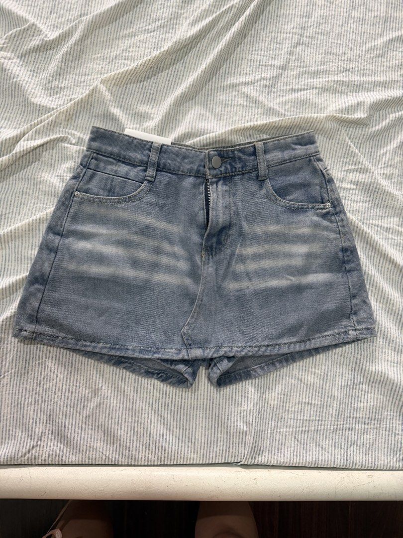 Fashion Jeans Denim Skort - Blue (Category: Shorts) located in Manila. Submitted by mento.ph (Listing ID 1442035321, Image 3). Description: - Brand: Fashion Jeans - Color: Blue Denim - Style: Classic, slightly faded wash - Features: Front and back pockets, button and zip closure - Ideal for: Casual wear - Approximate Measurements: 14" length, 26" waist - would best fit S-M frame.