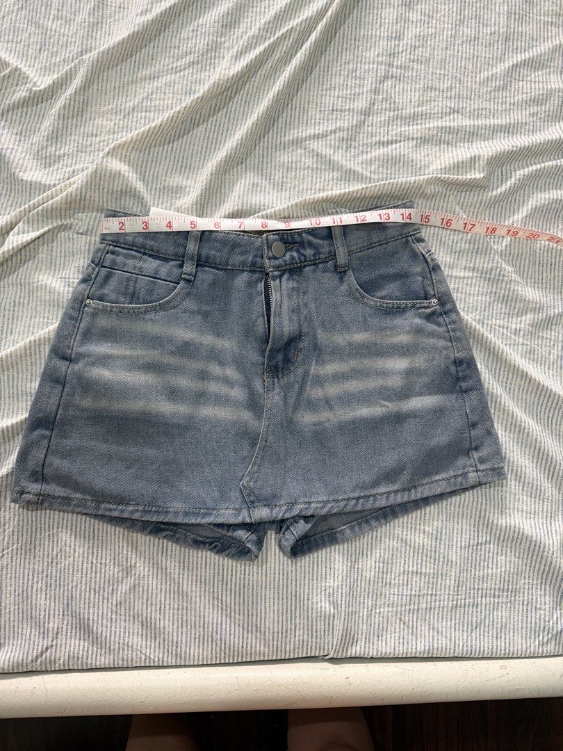 Fashion Jeans Denim Skort - Blue (Category: Shorts) located in Manila. Submitted by mento.ph (Listing ID 1442035321, Image 1). Description: - Brand: Fashion Jeans - Color: Blue Denim - Style: Classic, slightly faded wash - Features: Front and back pockets, button and zip closure - Ideal for: Casual wear - Approximate Measurements: 14" length, 26" waist - would best fit S-M frame.
