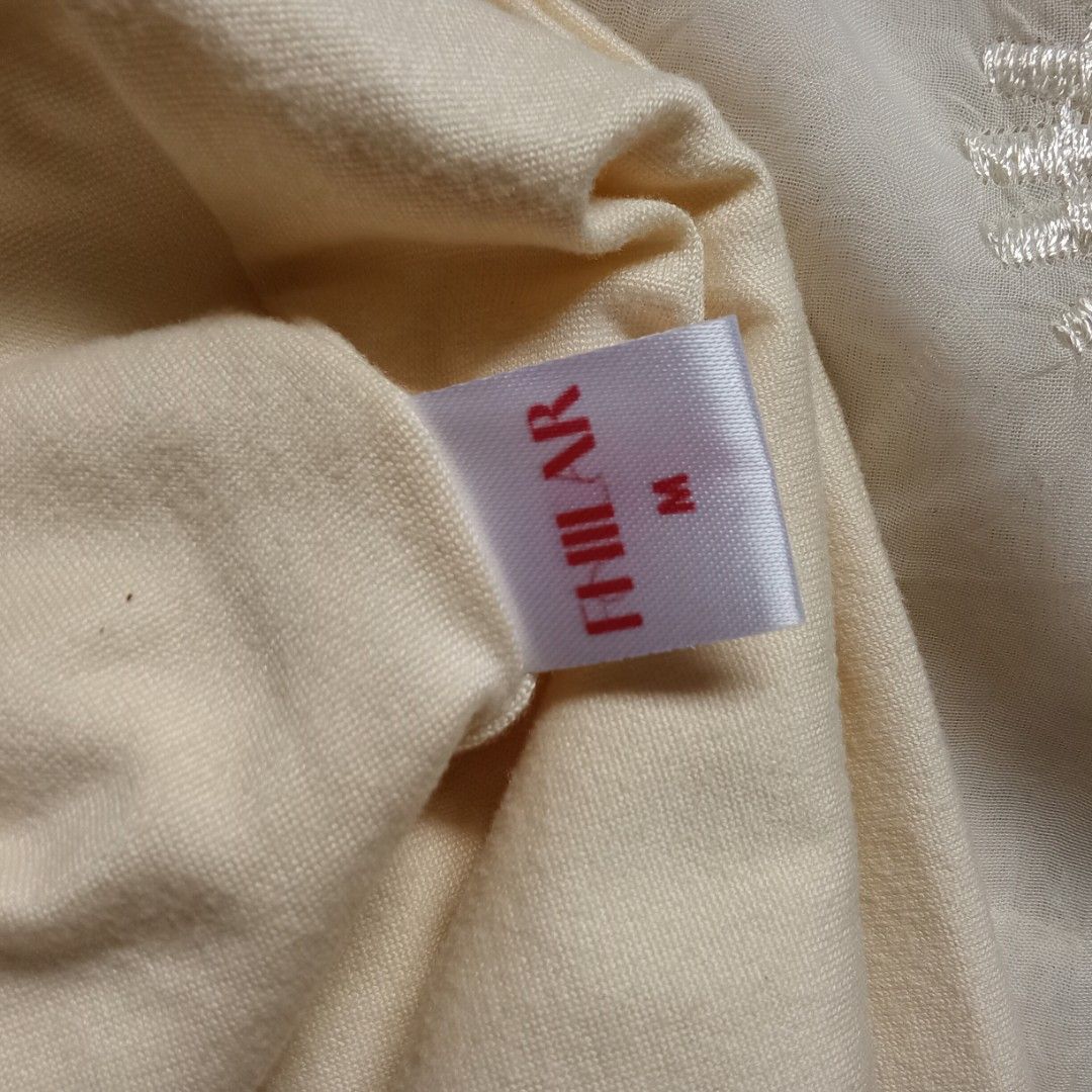 FHILAR Cream Spaghetti Strap Tank Top Size M (Category: Sleeveless) located in Talisay. Submitted by peonisces (Listing ID 1442116571, Image 3). Description: ๑ fits medium ๑ color rate: 10/10 (CREAM) RFS: will buy other size hihi - Cream-colored tank top from FHILAR - Spaghetti straps - Size Medium (M) - Made of soft material - Perfect for layering or wearing on its own - Comfortable and stylish.