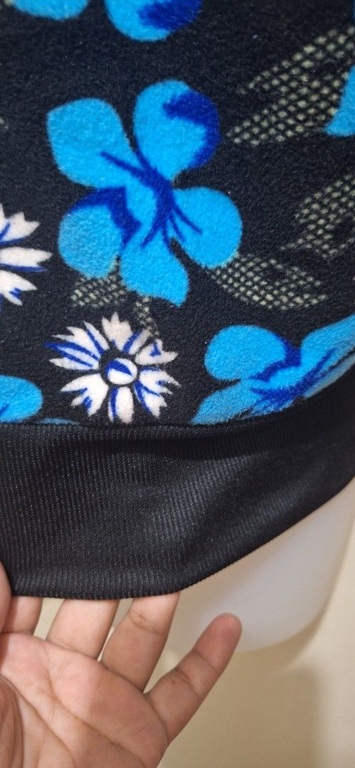 Fullzip Fleece Jacket SW16 BL25 Small-Medium Fit (Category: Coats, Jackets and Outerwear) located in Los Banos. Submitted by mckecollection (Listing ID 1442054407, Image 2). Description: - Black fleece jacket with a cool blue and white floral print. - Full zip closure for easy wear. - Ribbed cuffs and hem for a snug fit. - Lined with bright yellow fleece for ultimate warmth. - Fits like a Small to Medium. - Ideal for cooler weather and staying co