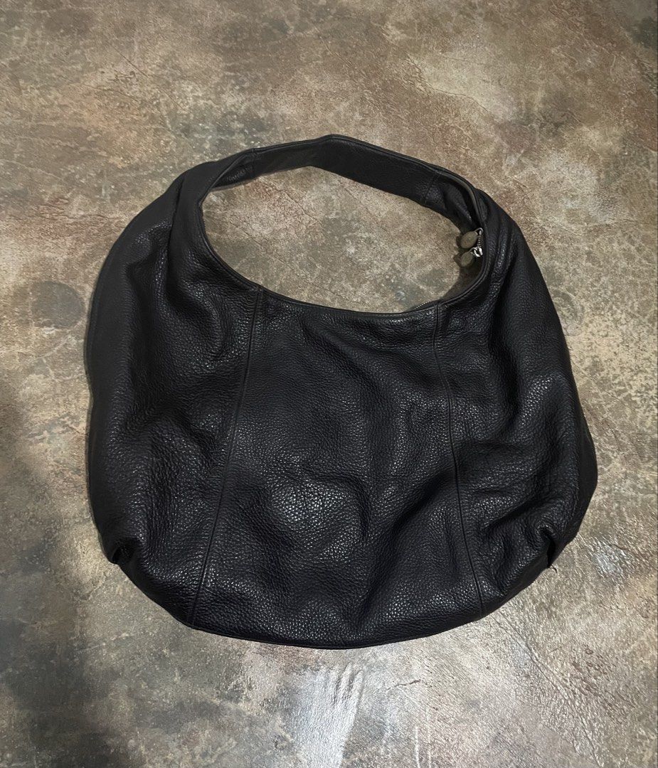 FURLA dark brown hobo bag (Category: Luxury Bags & Wallets) located in Davao. Submitted by mj_designervintagecurator (Listing ID 1442128441, Image 2). Description: 📌no damage still in good condition preloved from US may tawad pa 📌large size can fit laptop 📌width 20 - length 12 inches.