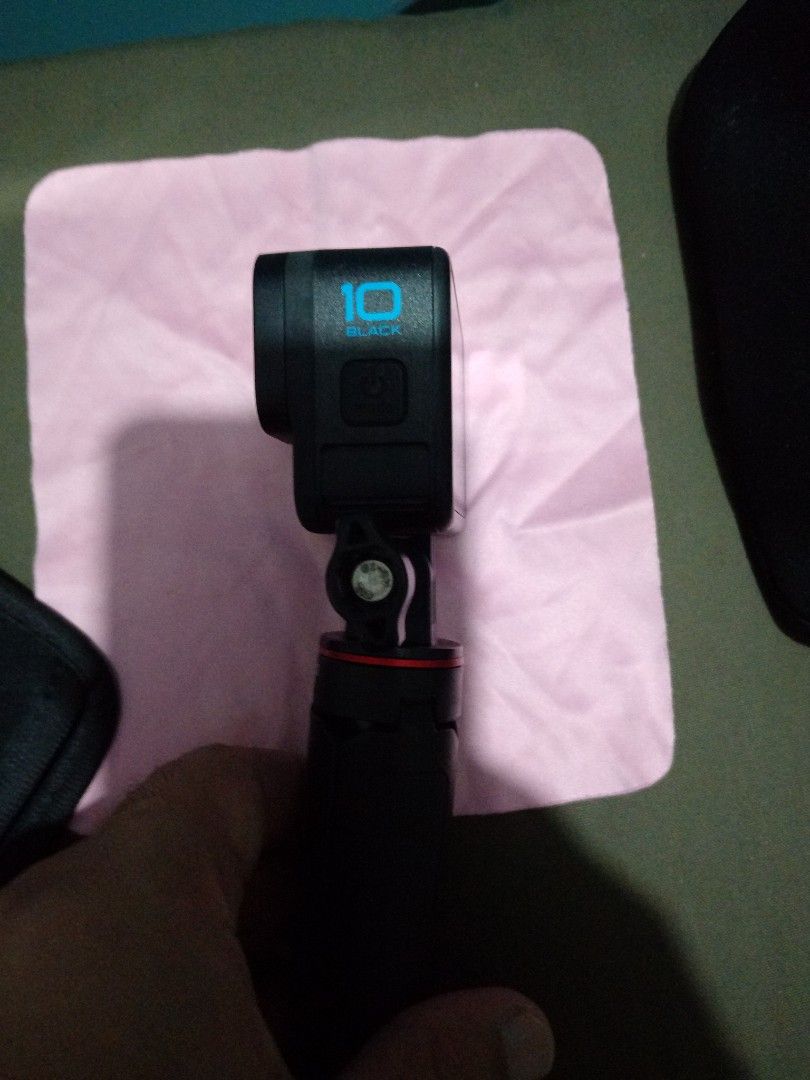 GoPro HERO10 Black Action Camera with ULANZI Mini Tripod (Category: Cameras) located in Manila. Submitted by silenthawk_5f2a27 (Listing ID 1442007164, Image 2). Description: - GoPro HERO10 Black - Includes ULANZI mini tripod and micro sd card - with carry case and charging cord - Tested and confirmed working - Excellent for capturing adventures - Records in high quality - Ready for your next trip or project - not used in extreme conditions just r