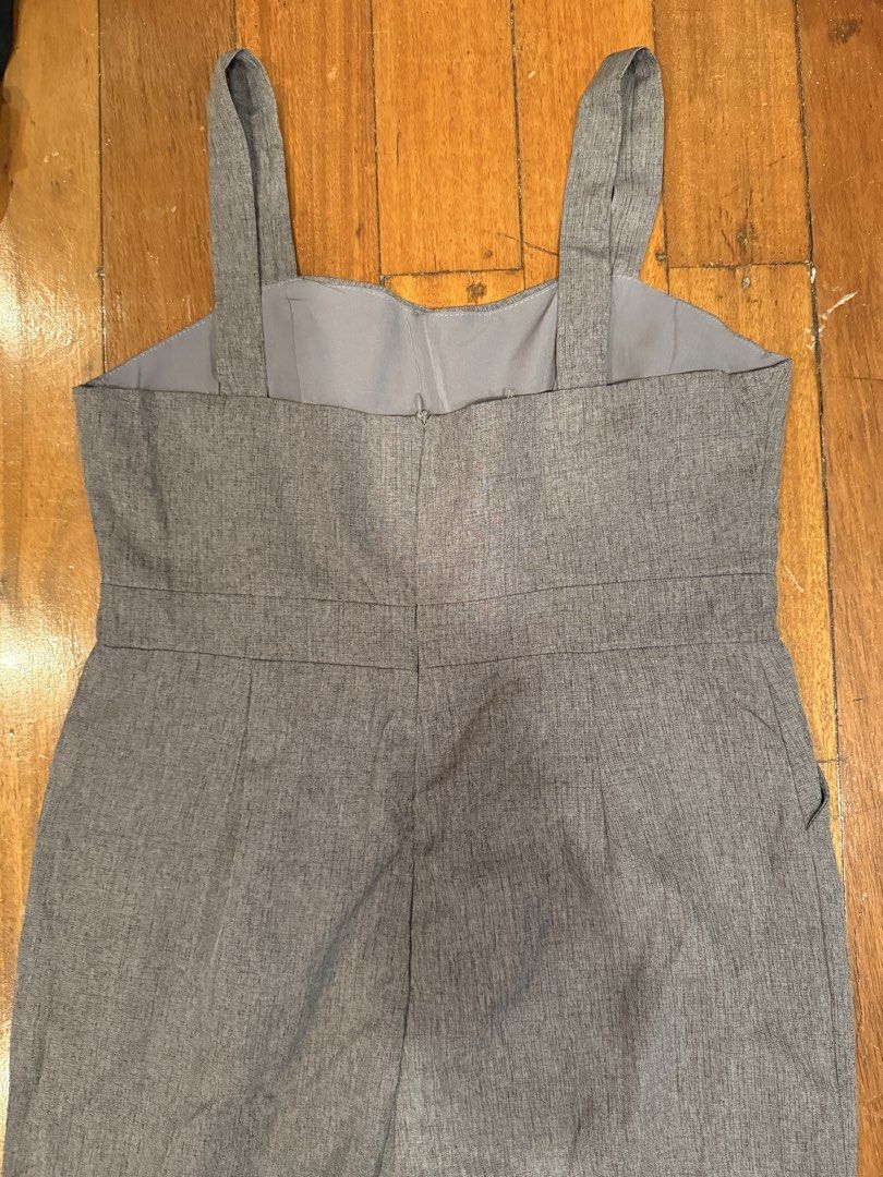 Grey Wide Leg Jumpsuit with Straps (Category: Jumpsuits) located in Pasig City. Submitted by atbp__ (Listing ID 1442121729, Image 3). Description: - Grey wide-leg jumpsuit - Adjustable straps - Sweetheart neckline - Side pockets - Minor marks on front (please check photos) - Perfect for dressing up or down.